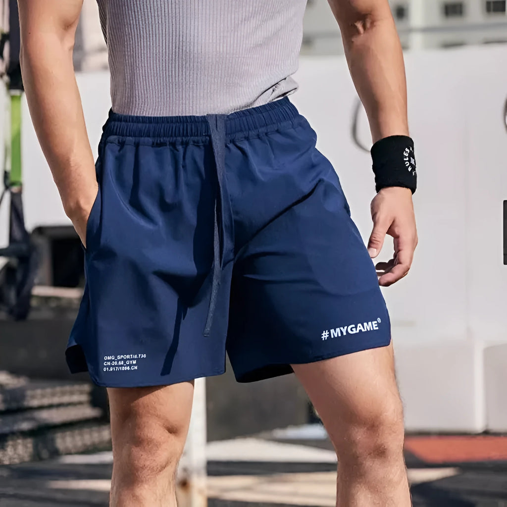 Men's grey quick-drying fitness shorts with high elasticity for summer training workouts.