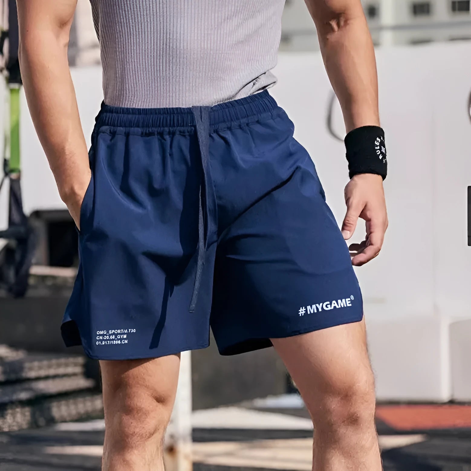 Men's grey quick-drying fitness shorts with high elasticity for summer training workouts.