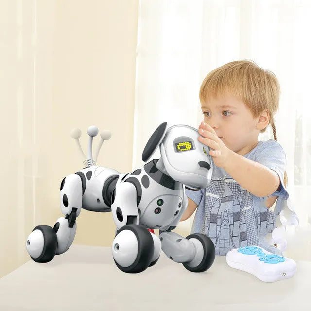 Smart robot dog electronic toy with remote control on a table.
