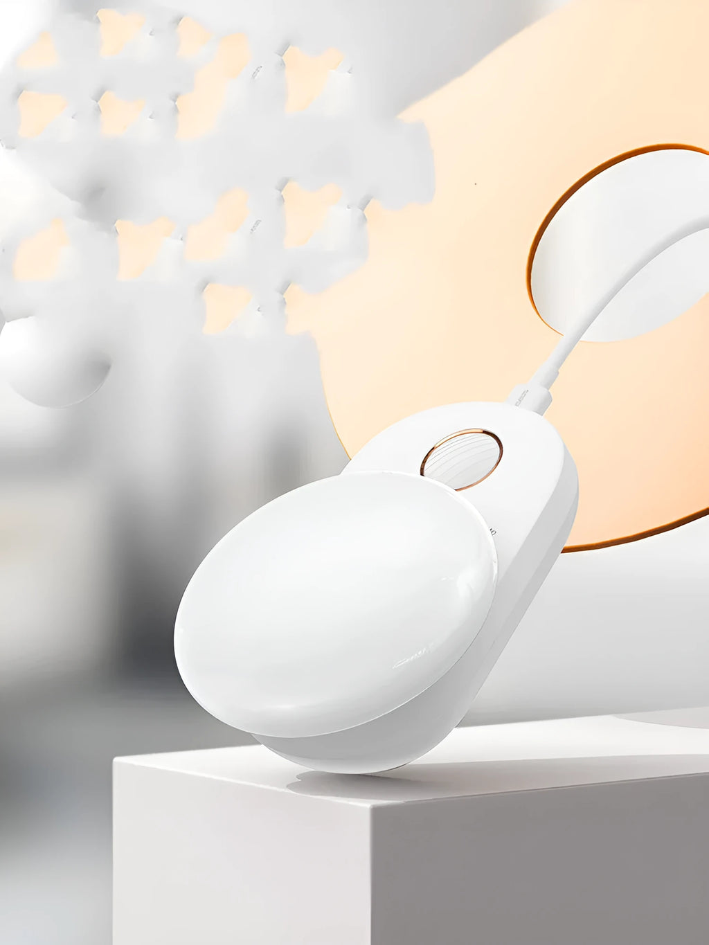 White rechargeable LED night light with motion sensor for bedside use.