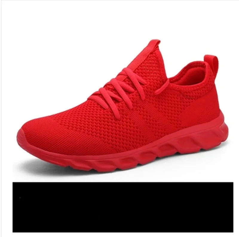 Men's black and white casual sports shoes with mesh upper and round toe design for jogging