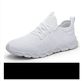 Men's black and white casual sports shoes with mesh upper and round toe design for jogging