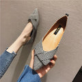 Women's pointed toe flat shoes in red with a low heel and cotton upper.