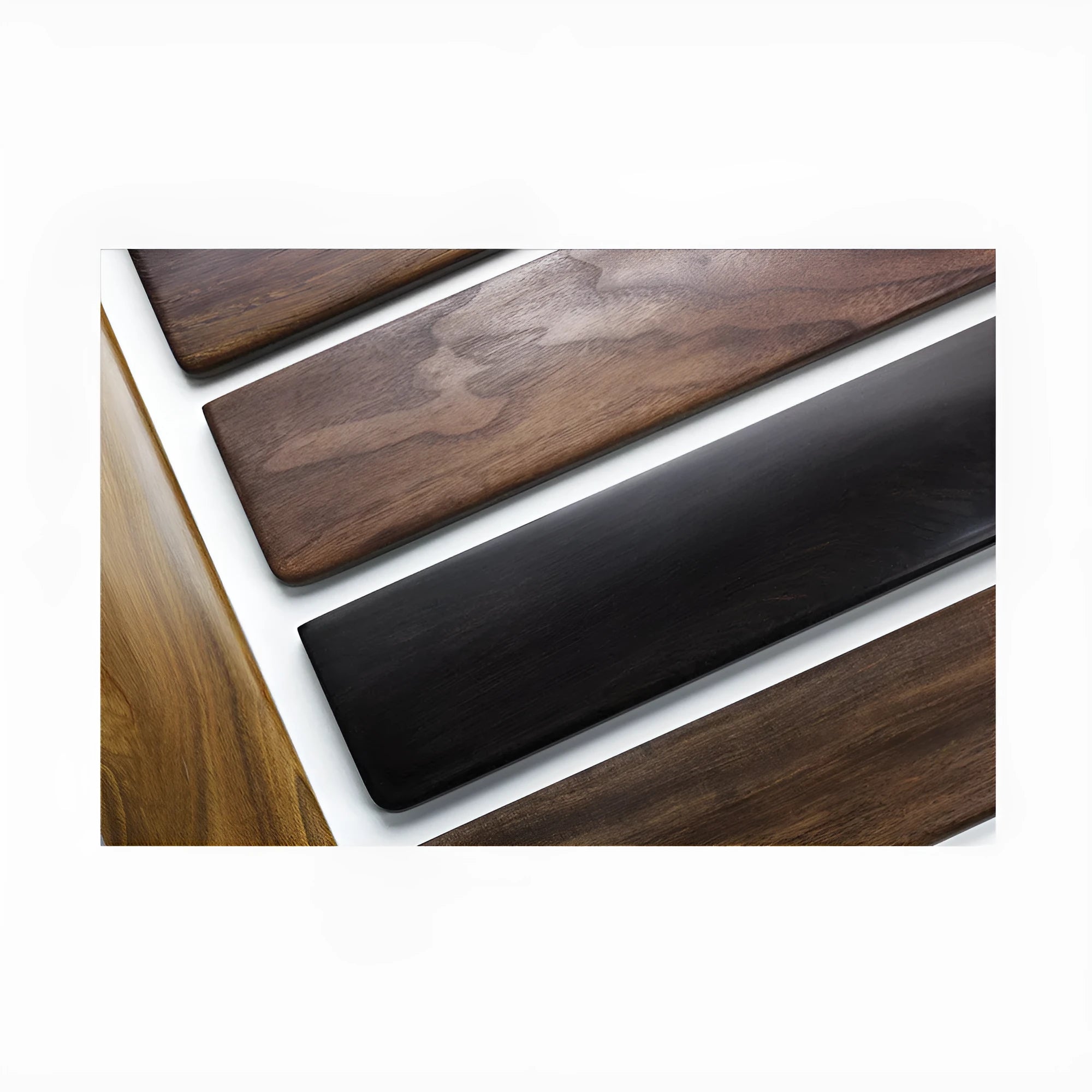Solid black walnut wood keyboard wrist rest measuring 30cm long with curved ergonomic design