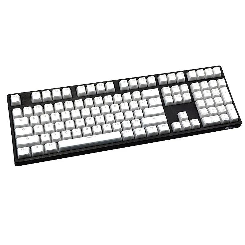 White pudding style mechanical keyboard keycaps with translucent sides and dye sublimation legends