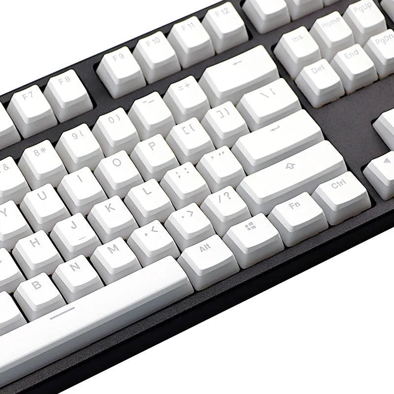 White pudding style mechanical keyboard keycaps with translucent sides and dye sublimation legends