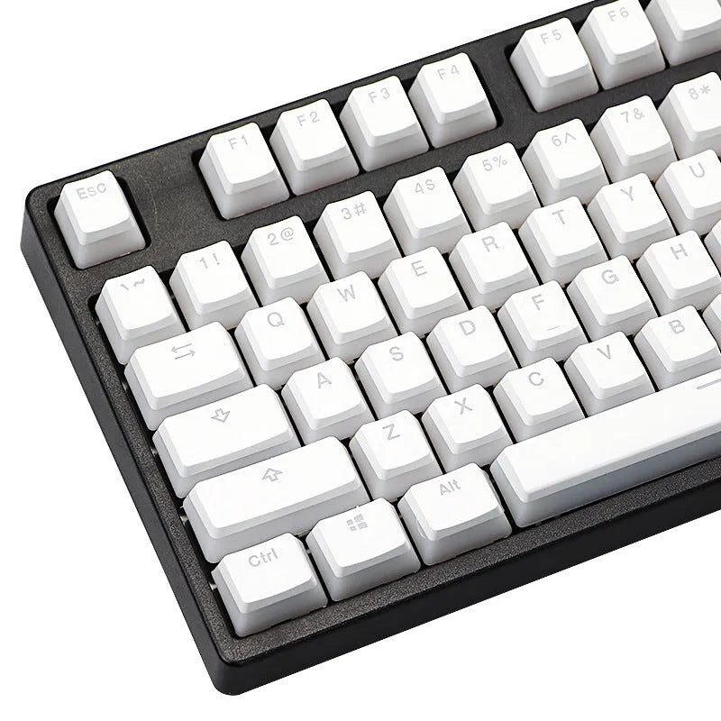 White pudding style mechanical keyboard keycaps with translucent sides and dye sublimation legends