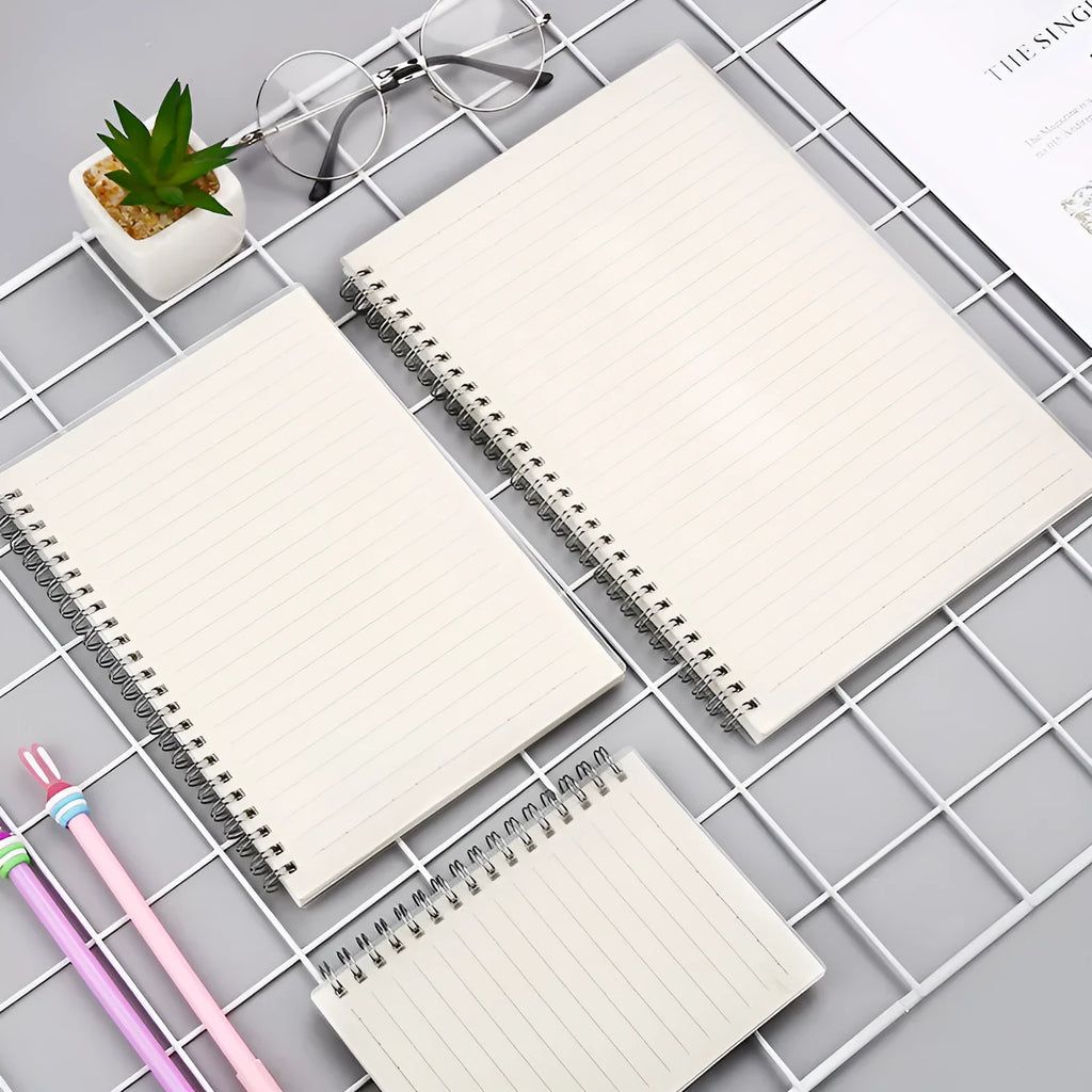 Coil-bound notebook with horizontal line and dot matrix grid pages in A5 size.