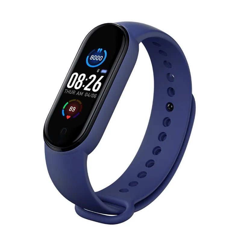 M5 smart sports bracelet in black, blue or red on a wrist, showing the 0.96-inch touch screen displaying heart rate data.