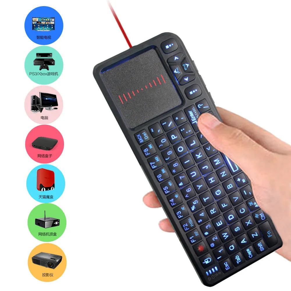 Black laser teaching mini wireless keyboard with a touch screen on a desk