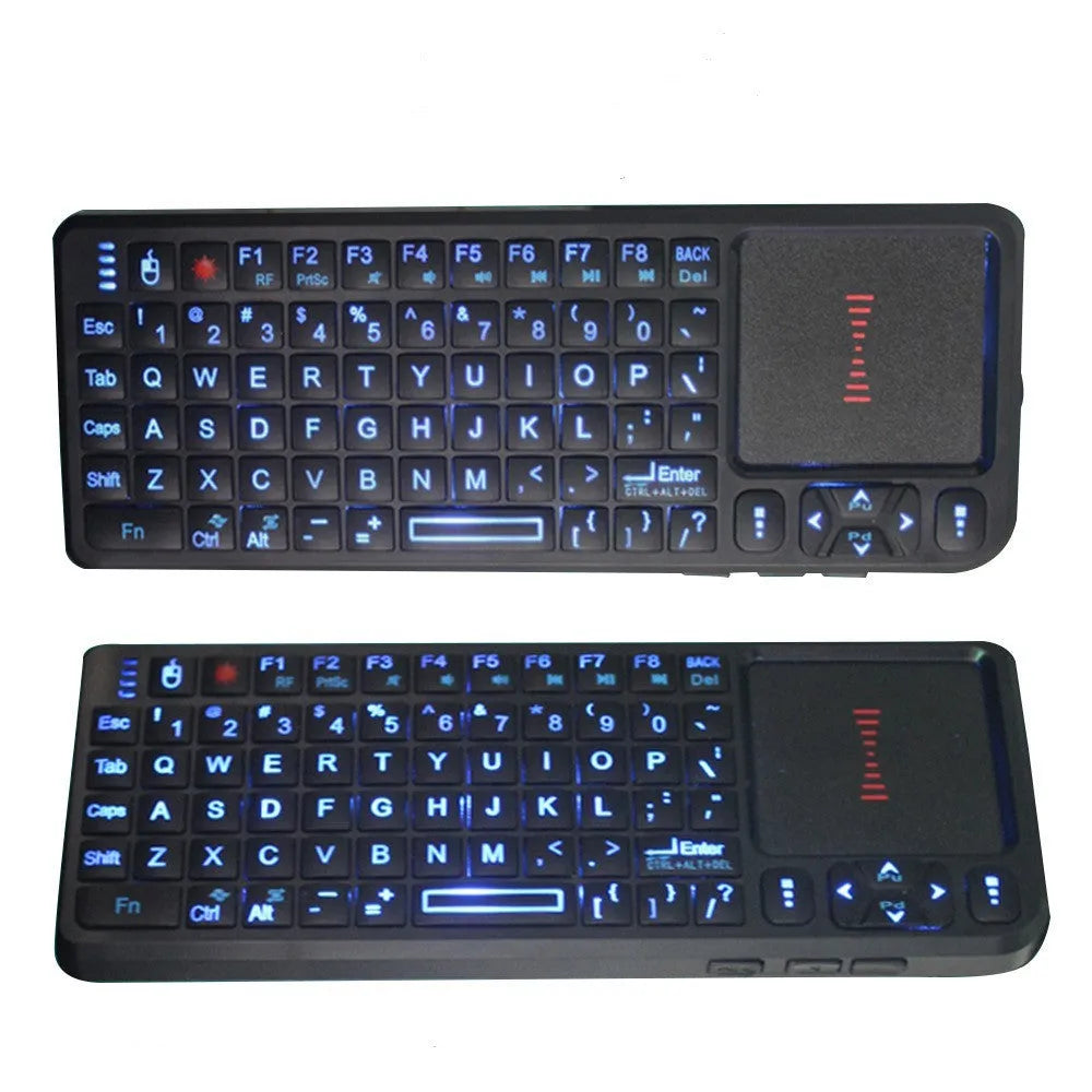 Black laser teaching mini wireless keyboard with a touch screen on a desk