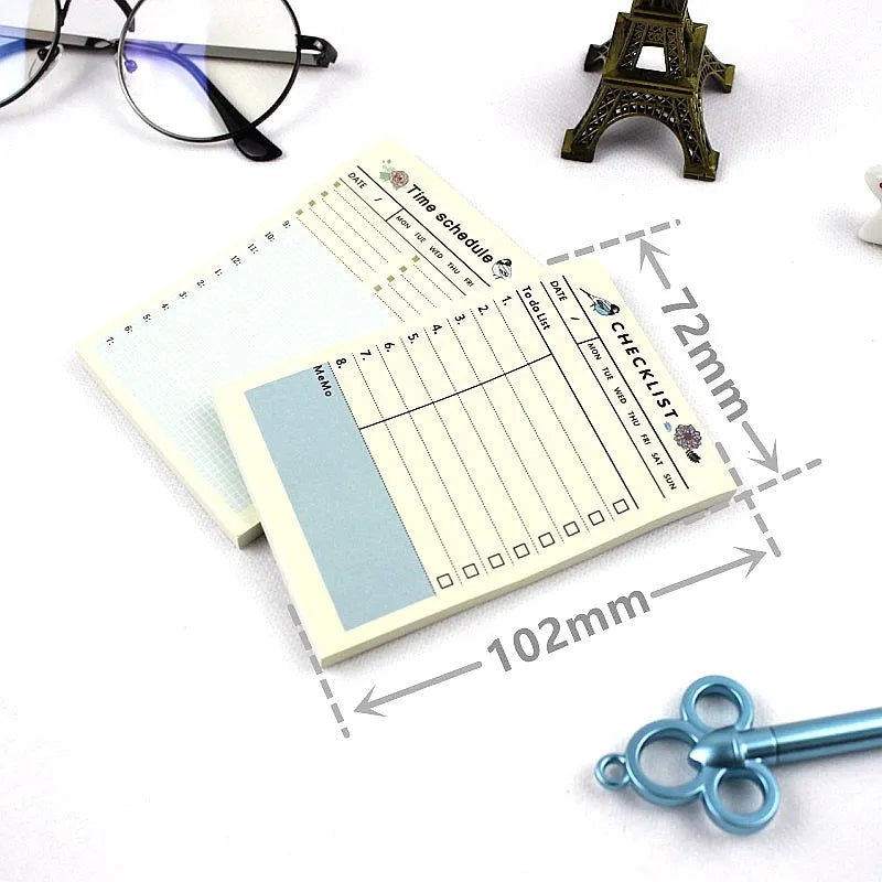 Pocket-sized weekly monthly planner notebook showing four different layout design options