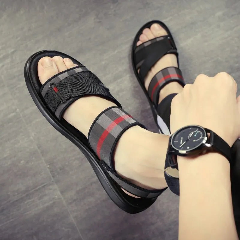 Youth leisure sports sandals with Lycra upper on a polyurethane sole, showing size options.