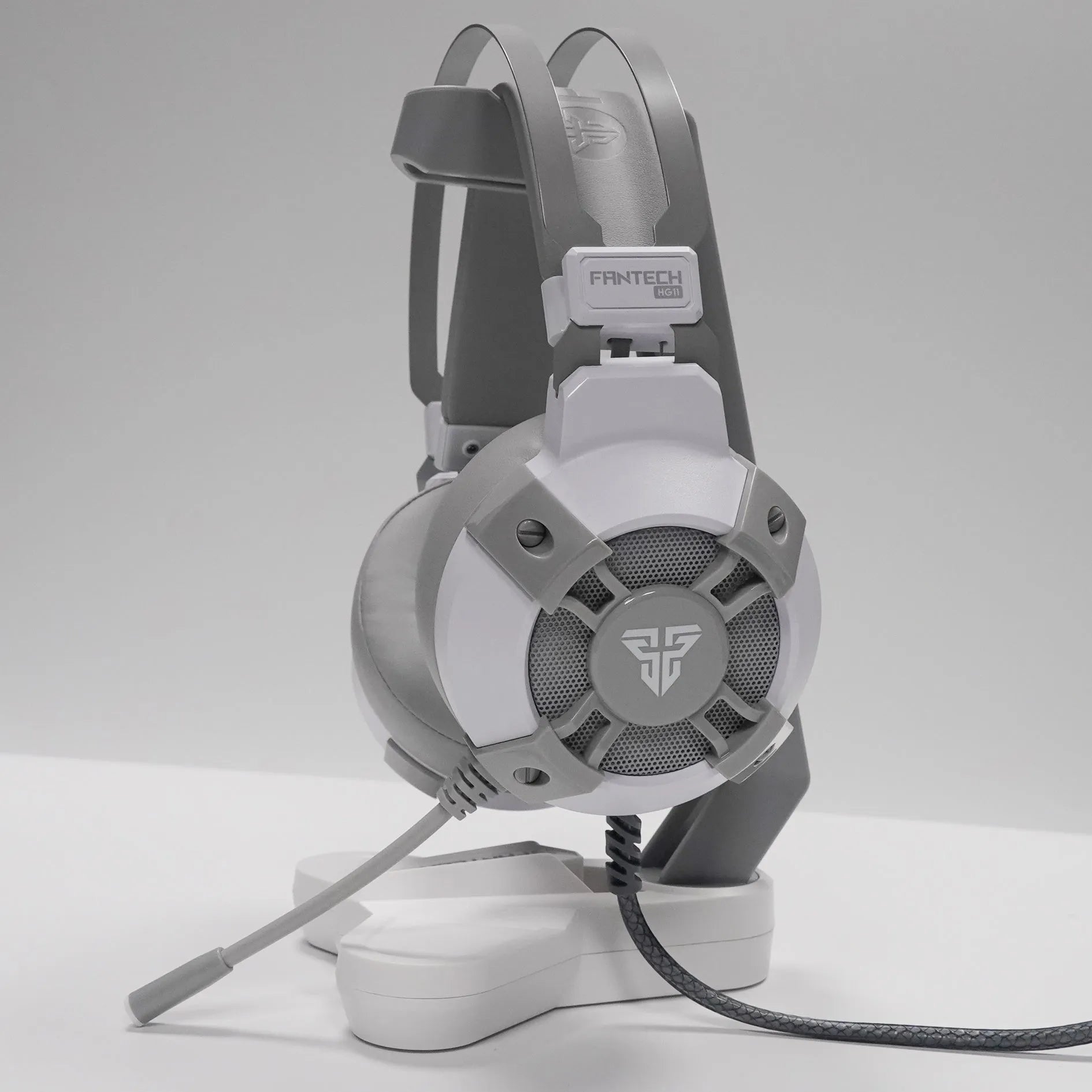 Black FANTECH HG11 USB gaming headset with RGB lights on earcups and a cable-mounted control.