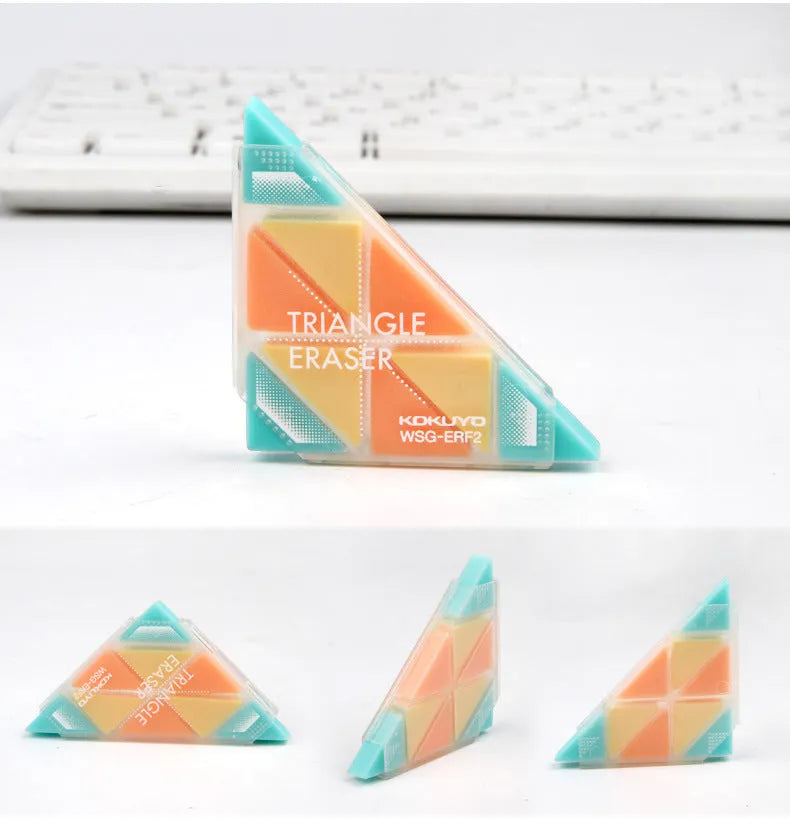A blue PVC triangle eraser on a wooden desk next to a pencil and paper.