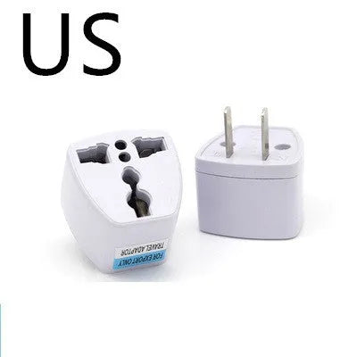A multi country travel conversion plug for British, American, Australian, and European power sockets.