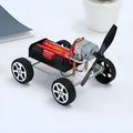 Wind Car DIY Electronic Science Kit with acrylic plastic chassis, dimensions 7.7cm by 10cm.