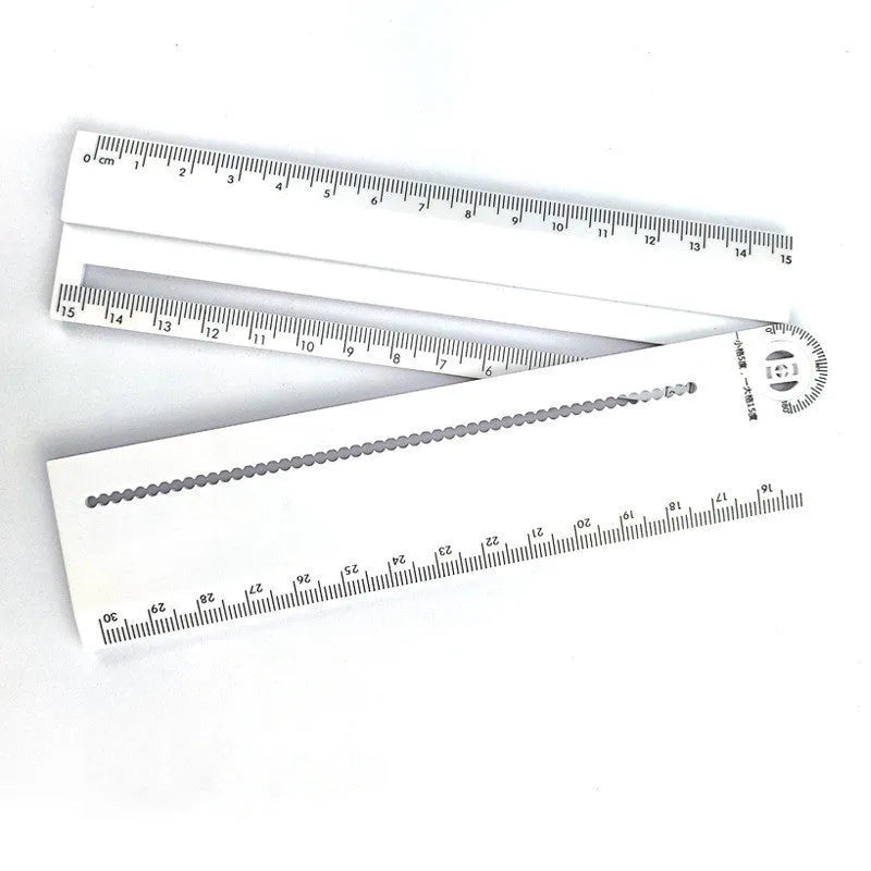 White plastic multi-function angle ruler showing measurement markings and 30cm length