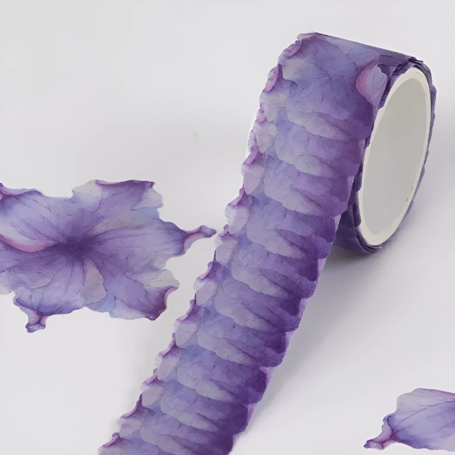 Roll of clover and paper tape in blue, cherry blossom, mixed colour, and violet options for hand book stickers.