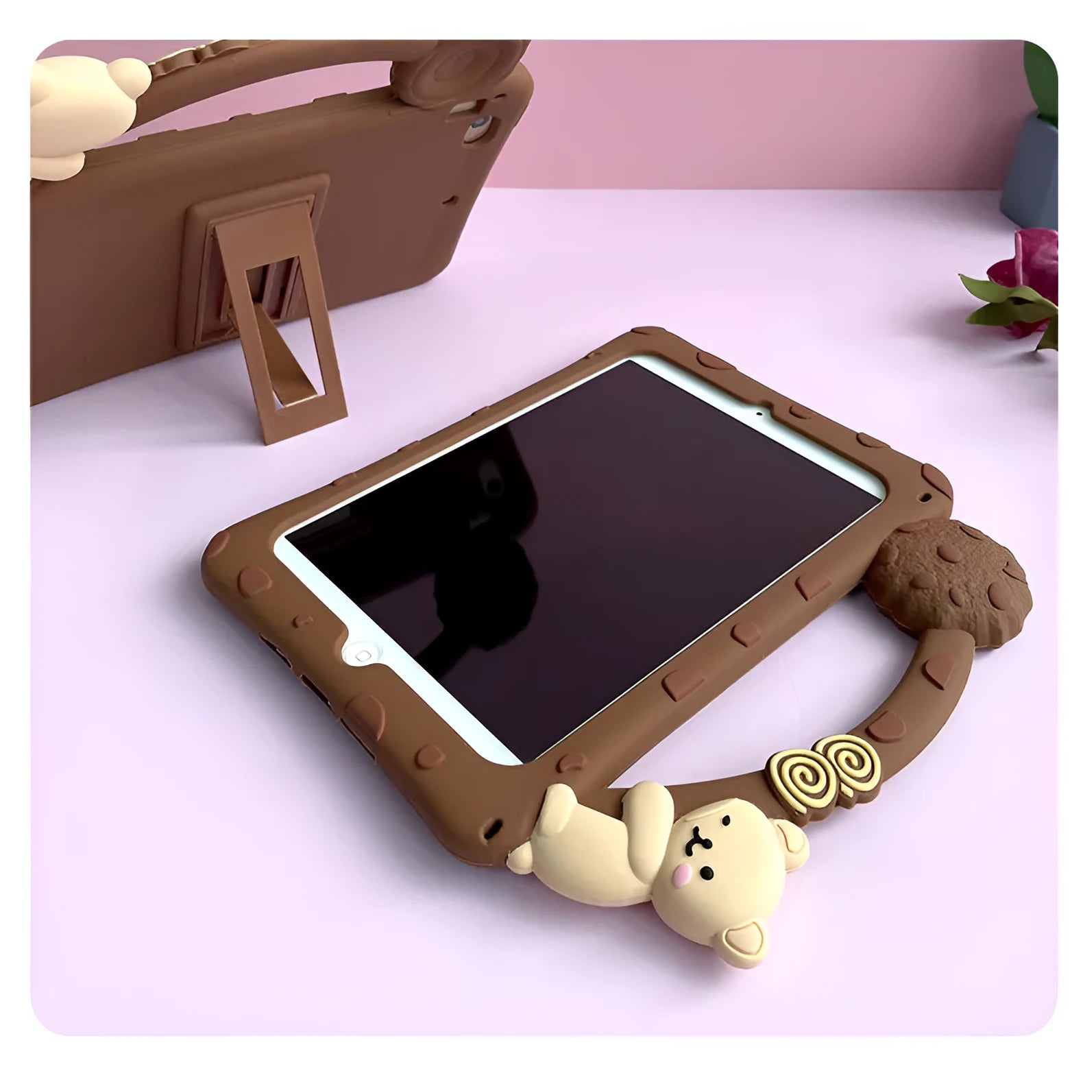 Brown cartoon silicone sleeve case with a carry bracket for an iPad tablet.