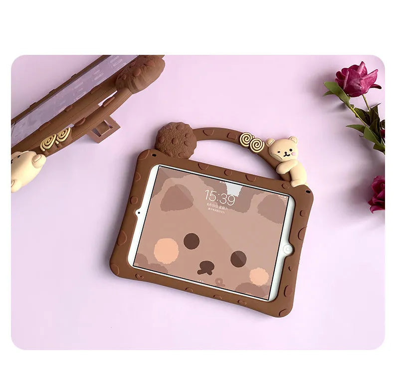 Brown cartoon silicone sleeve case with a carry bracket for an iPad tablet.