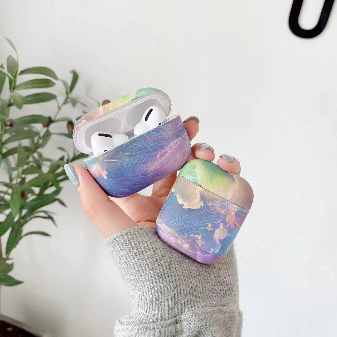AirPods Pro hard shell protective sleeve with watercolour design in pink and blue colour options