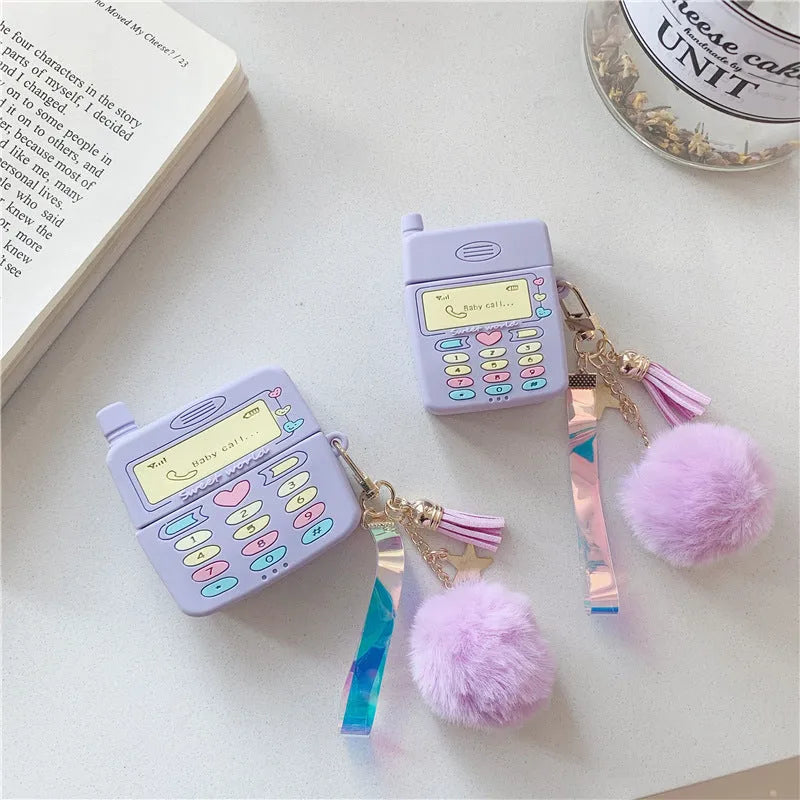 Purple silicone protective case for Apple AirPods with attached white fur ball pendant