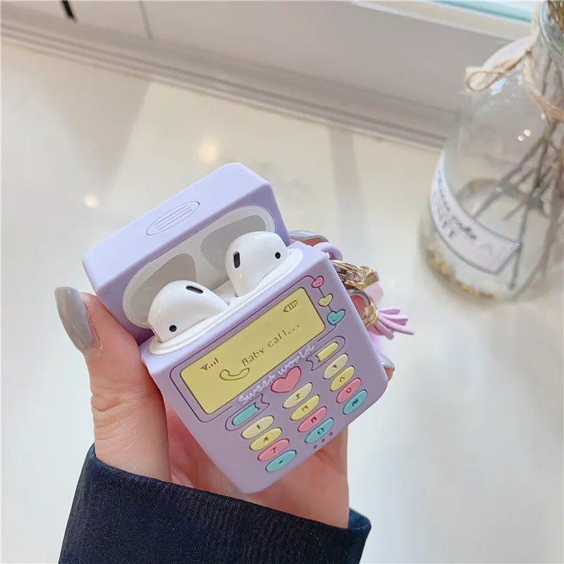 Purple silicone protective case for Apple AirPods with attached white fur ball pendant