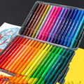 Set of double-headed watercolour pens with soft brush and fine tips, a drawing book, and a hook line pen.