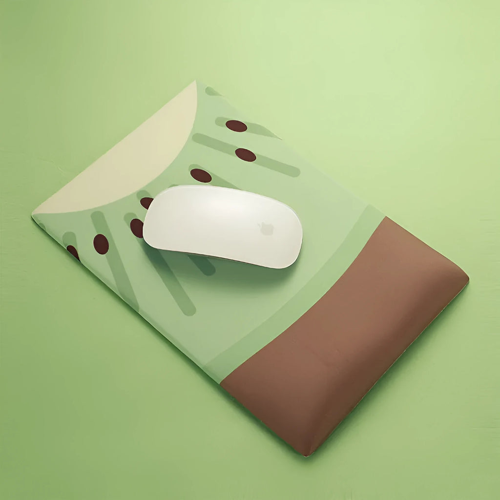 Kiwi fruit themed mouse pad with integrated thick grey gel wrist support cushion.