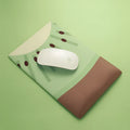 Kiwi fruit themed mouse pad with integrated thick grey gel wrist support cushion.