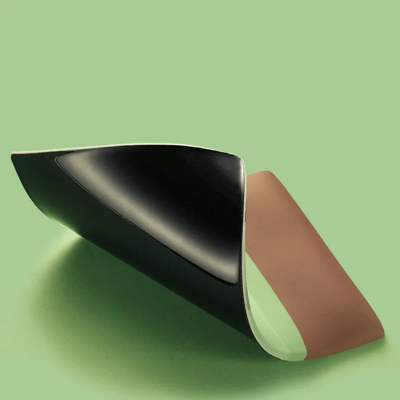 Kiwi fruit themed mouse pad with integrated thick grey gel wrist support cushion.