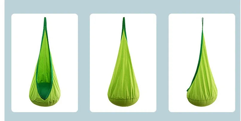Green cotton pod swing chair hanging outdoors with inflatable cushion