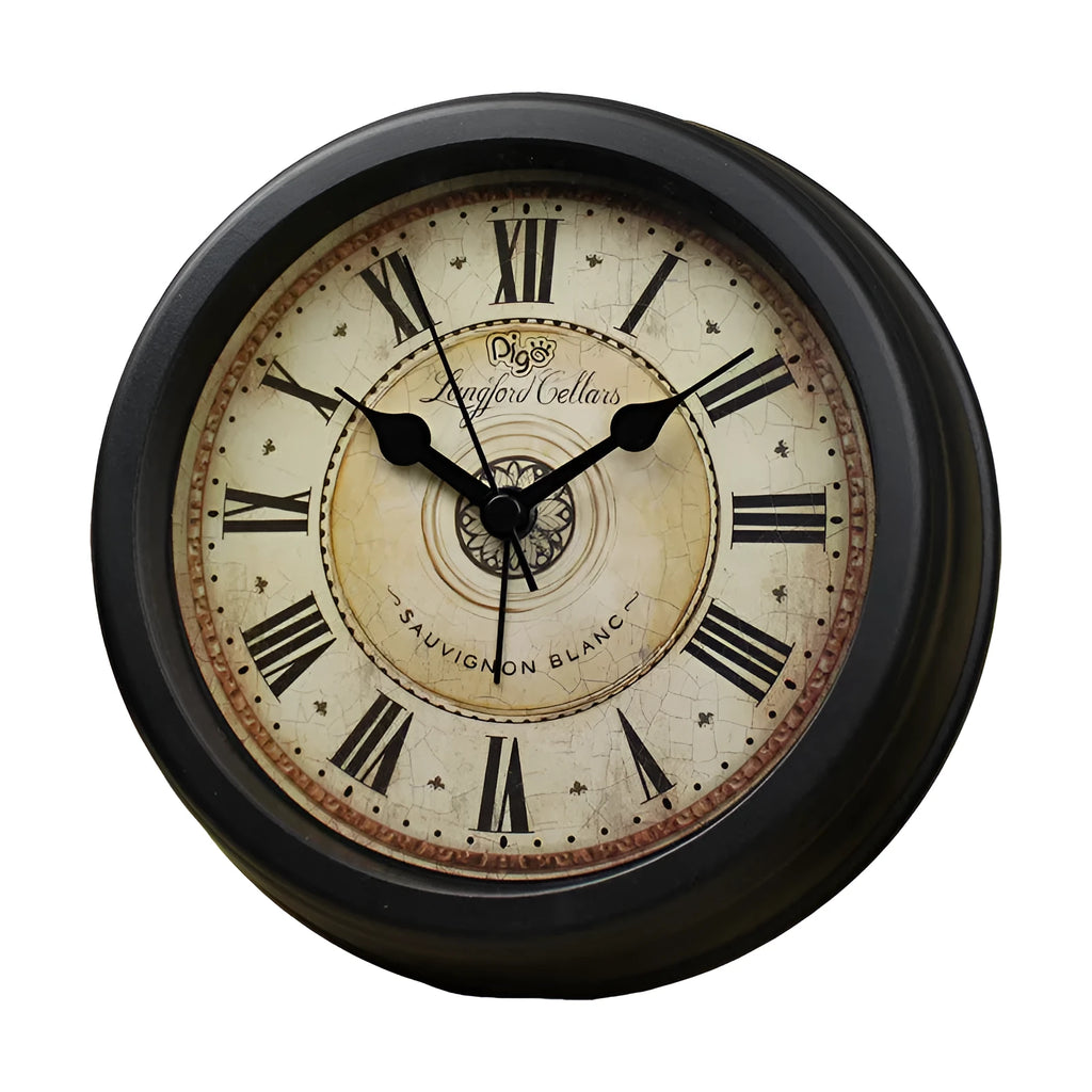 Round European style retro desk clock with silent alarm on a wooden surface.