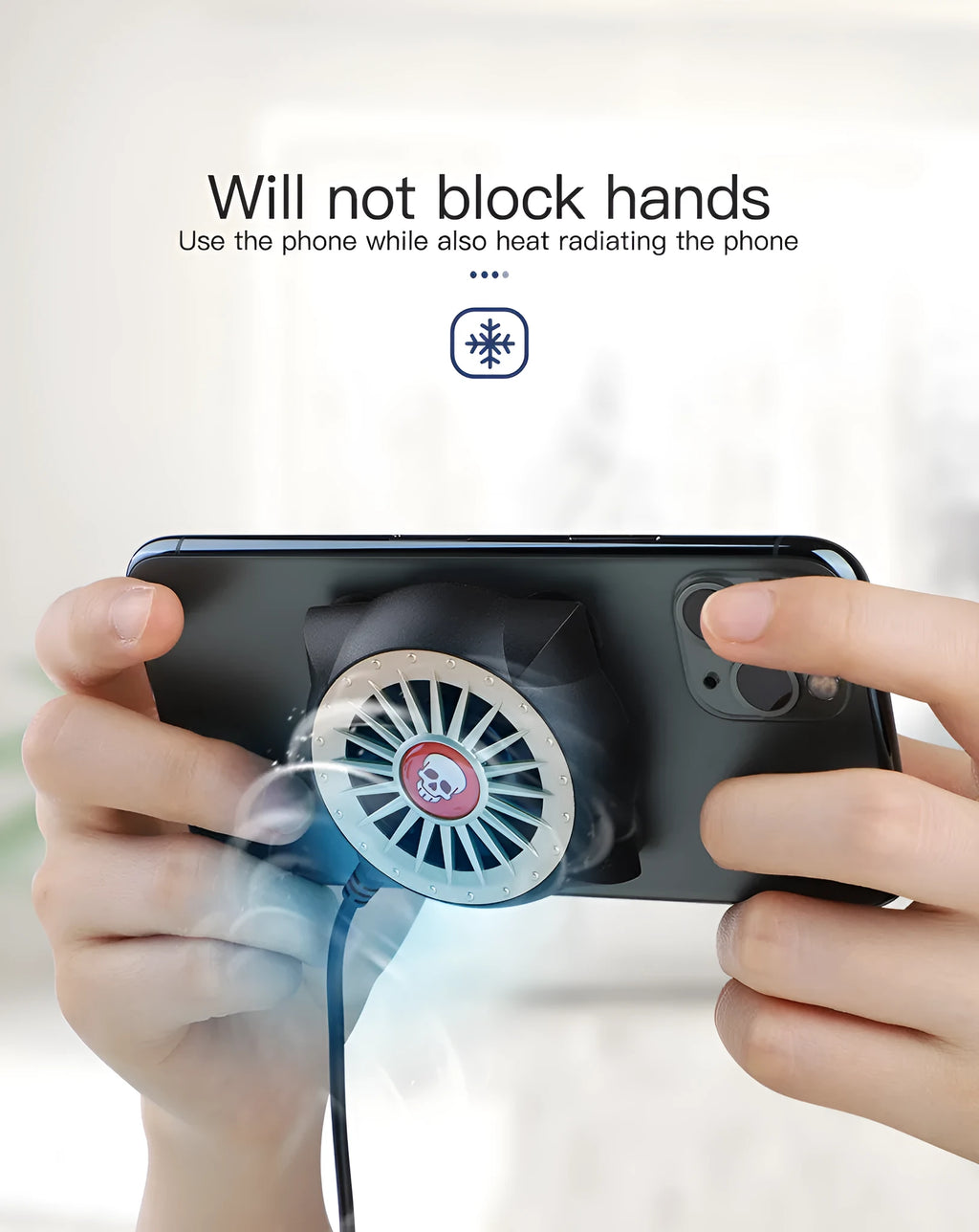 Black smartphone cooling fan with suction cup mount attached to mobile phone