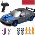 Huangbo red electric remote control drift car toy on a surface