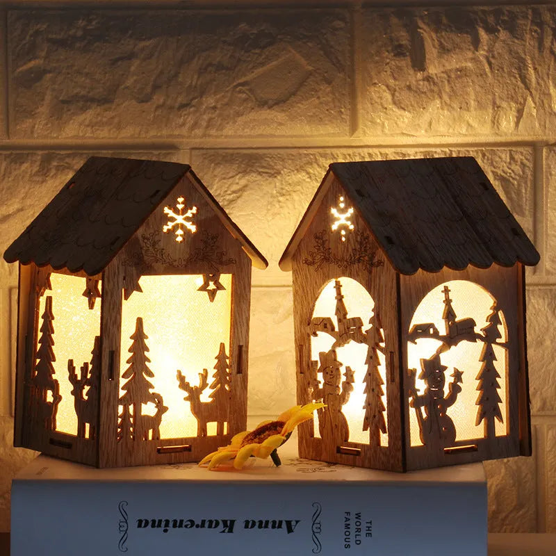 Three wooden Christmas ornaments: small log bell, wooden house with Santa, wooden house with snowman in natural wood colour