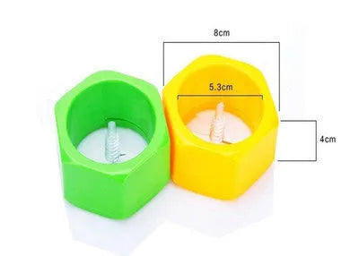 Yellow and green spiral vegetable cutter kitchen gadget for slicing cucumbers.
