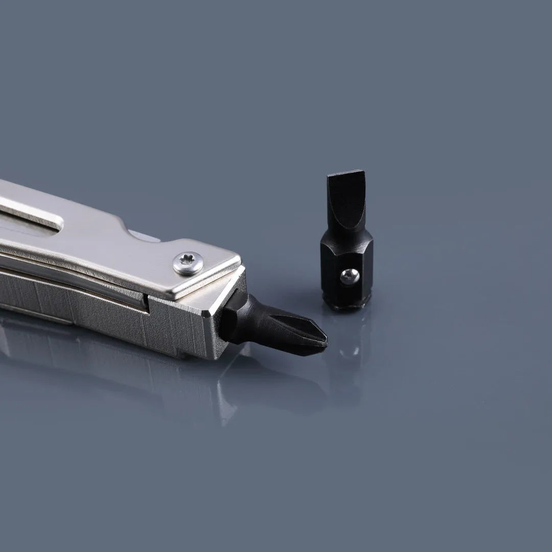 White stainless steel multi-function tool showing wrench, knife, and needle nose pliers components.