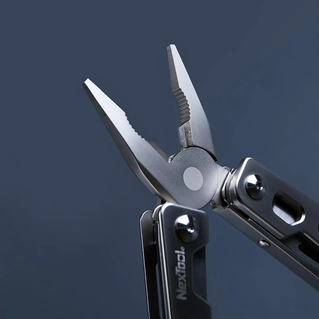 White stainless steel multi-function tool showing wrench, knife, and needle nose pliers components.