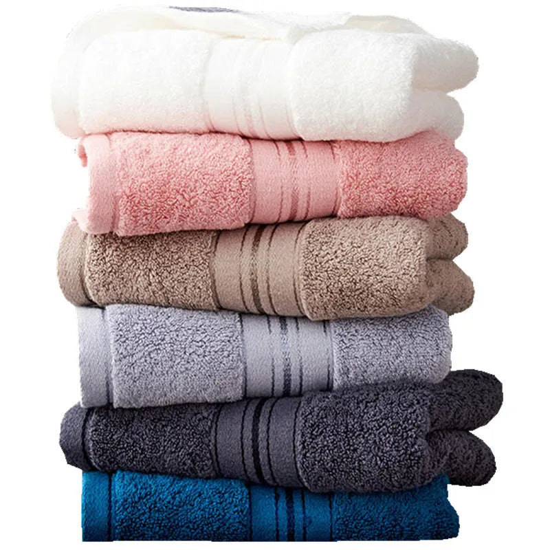 Pure colour thick cotton bath towel set showing three pieces: large bath towel, hand towel, and square scarf