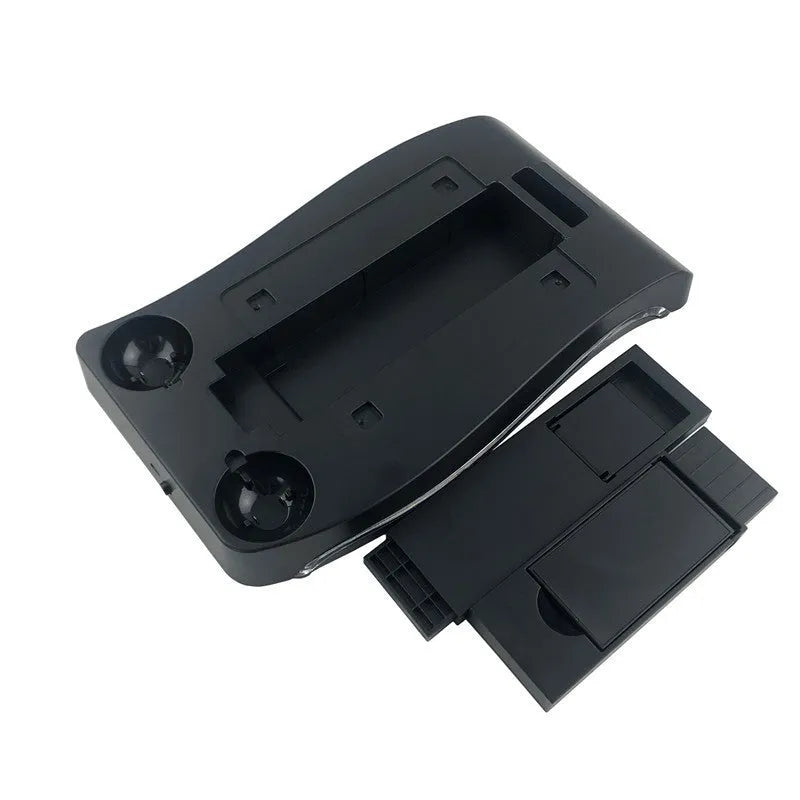 Black ABS plastic charging base dock for a PlayStation 4 VR game controller.