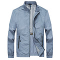 Kentino men's blue lightweight polyester summer shirt on a hanger, showing a fashionable city style cut.