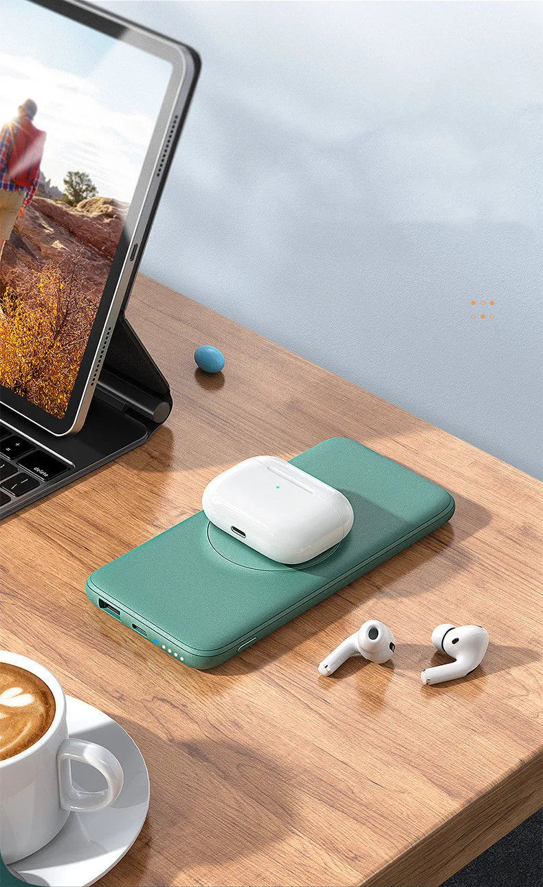 Mint green MagSafe-compatible magnetic wireless charging power bank with clip, showing dimensions.