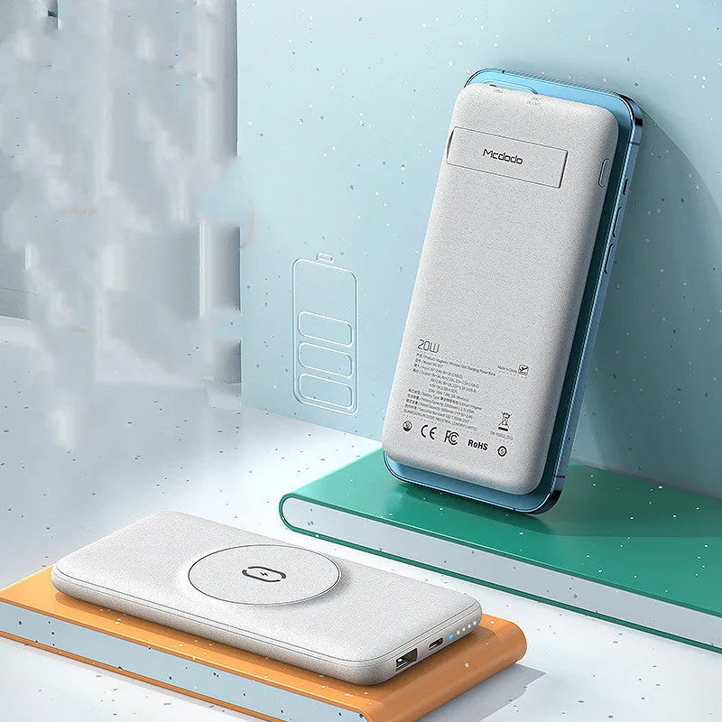 Mint green MagSafe-compatible magnetic wireless charging power bank with clip, showing dimensions.