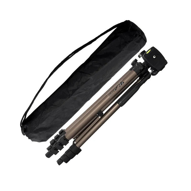 Black aluminium tripod extended to 1.3m with hydraulic head, mobile phone holder, and Bluetooth remote on a table.