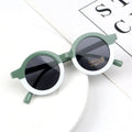 Children's round retro sunglasses with leopard print patchwork and PC frame in pink and leopard colourway