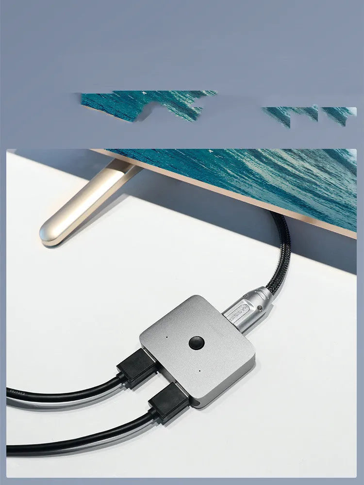 Gray HDMI splitter device with one input and two output ports for connecting multiple displays