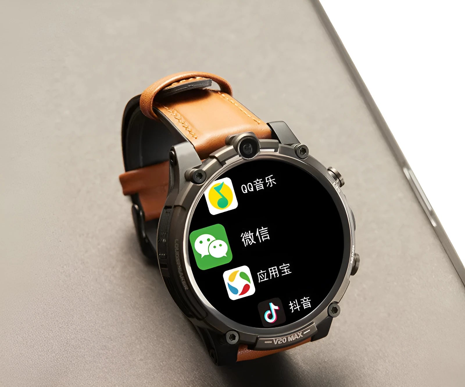 Black 4G smartwatch with a 1.6-inch screen, dual camera, and heart rate monitor on a wrist strap.
