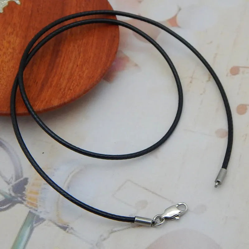 Adjustable wax rope necklace with stainless steel buckle shown in black, red, and brown colour options
